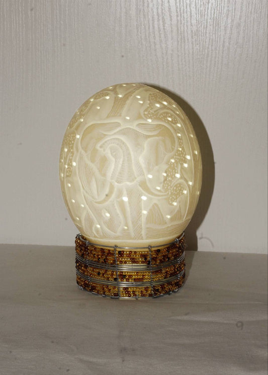 Ostrich Egg Fine Art carved Charging Elephant Lampshade. Authentic shell with tree carvings and Holes. Housewarming/office lighting gifts