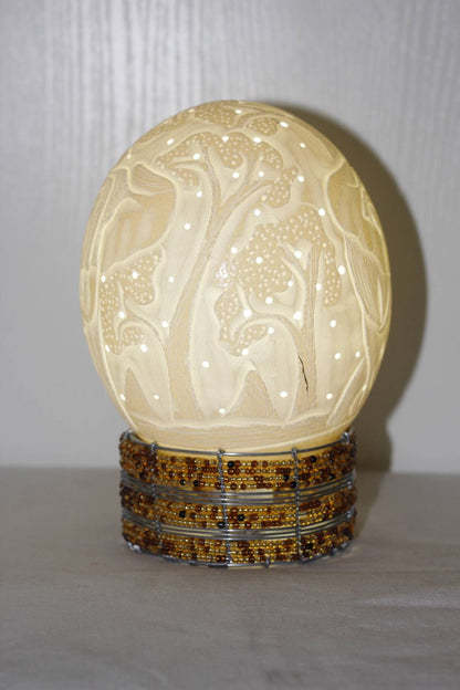 Ostrich Egg Fine Art carved Charging Elephant Lampshade. Authentic shell with tree carvings and Holes. Housewarming/office lighting gifts