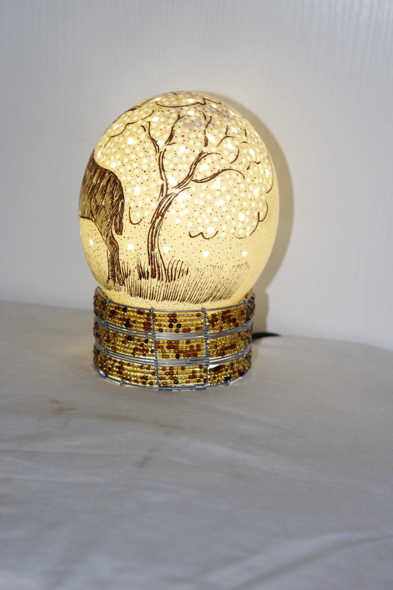 Scrimshaw Carved Kudu Antelope Ostrich Egg lampshade with Holes and tree Carvings. African art Ready to Ship Gift. Beaded lampstand optional