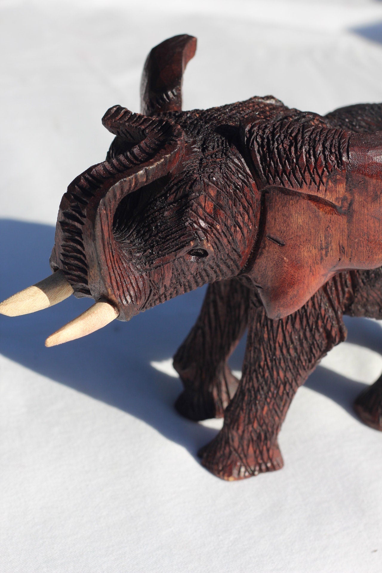 Handcarved Zimbabwean Mukwa Wood Elephant Trunk up. Dark Brown detailed and Polished African art Souvenirs. Unique gifts, Ready to Ship.