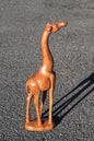 Fine Art Smooth Teak Wood Giraffe feeding/facing up figurine. Tall Zambian Carved Art Sculpture. Home/office decor, African animals gifts