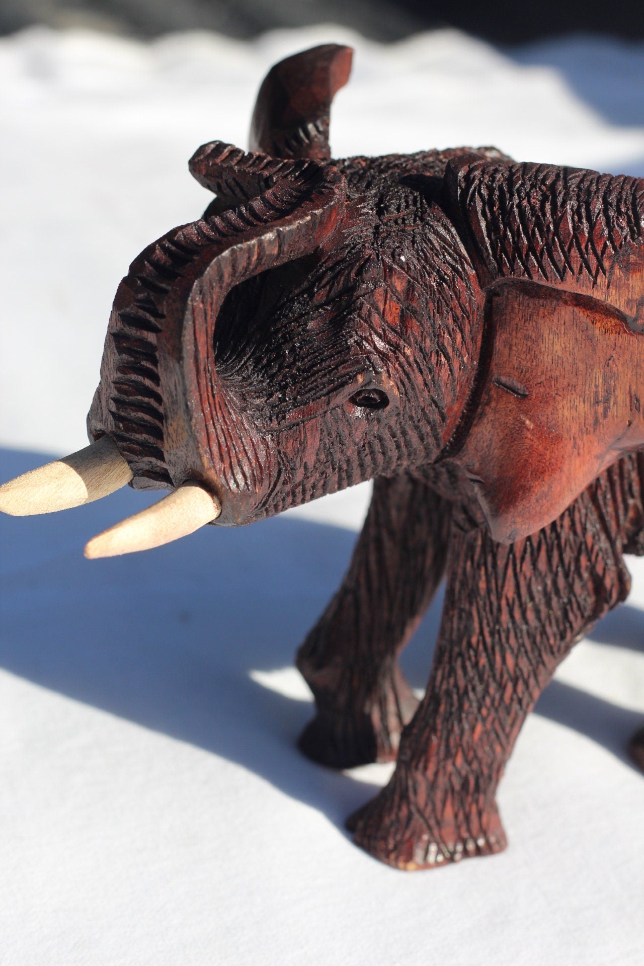 Handcarved Zimbabwean Mukwa Wood Elephant Trunk up. Dark Brown detailed and Polished African art Souvenirs. Unique gifts, Ready to Ship.