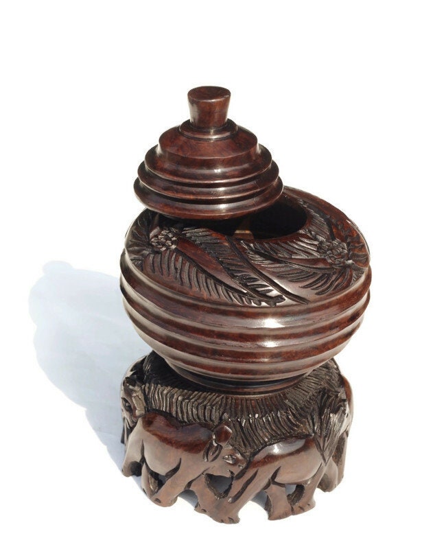 Iron Wood Malawian Hand Carved Storage Bowl. Circular Rings and Leaves design basin with Elephant, Rhino, Lion and Tree Carvings on the base