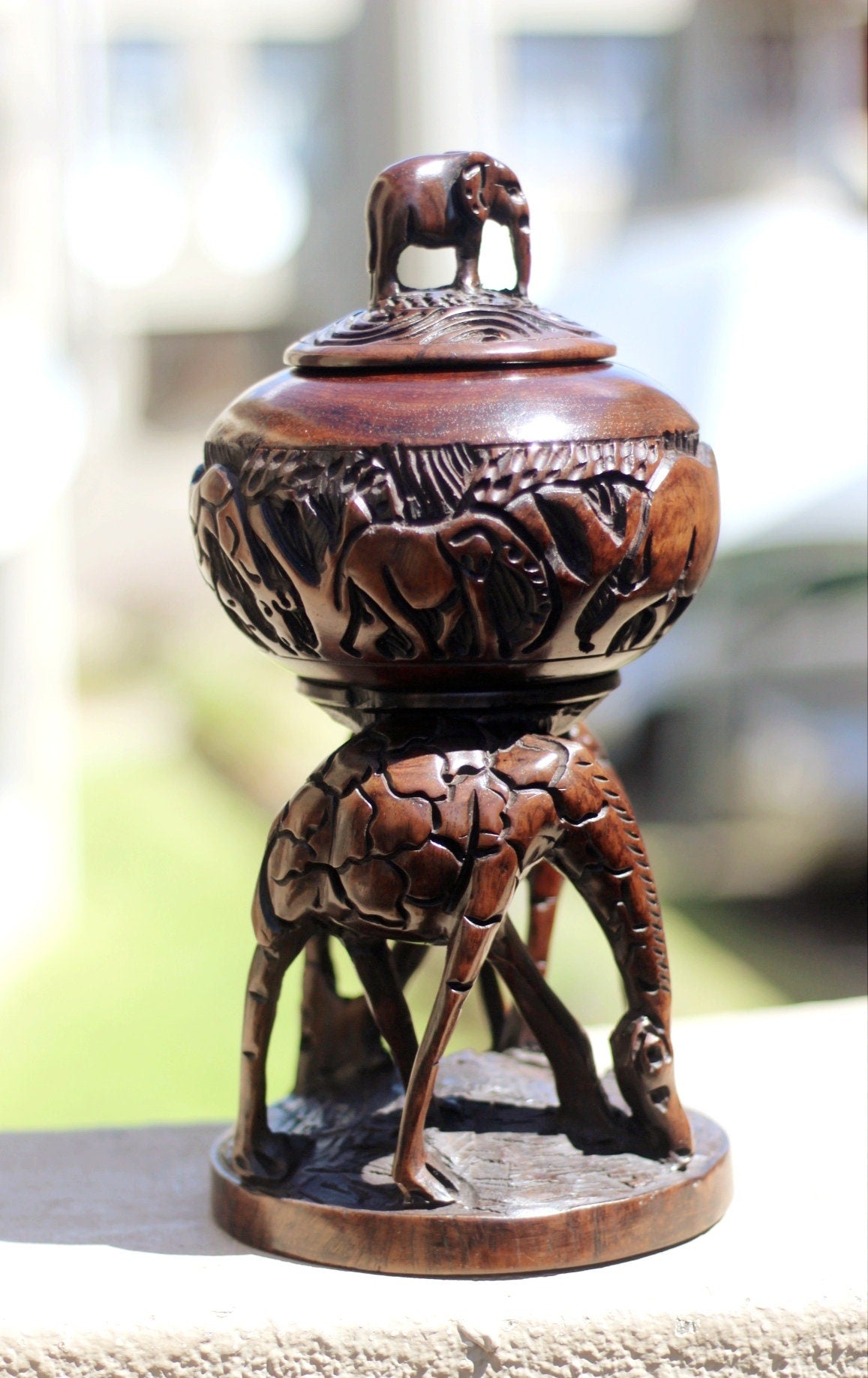 African big 5 themed bowl with Standing Elephant Lid on top of 2 Grazing Giraffes. Handcarved Malawian Ironwood Table Centrepiece Art gifts