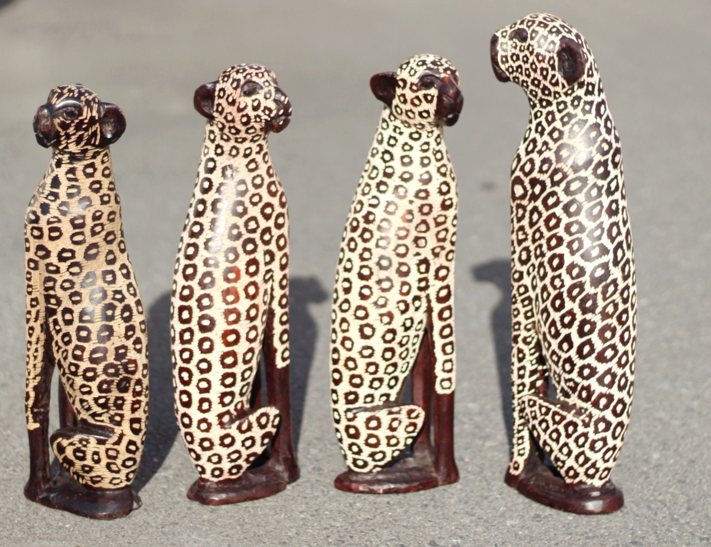 Seating Leopard Figurines. Inner Olive wood dark brown polished and gouged spotted hand carved big cat Sculptures. African art Decor Gifts.