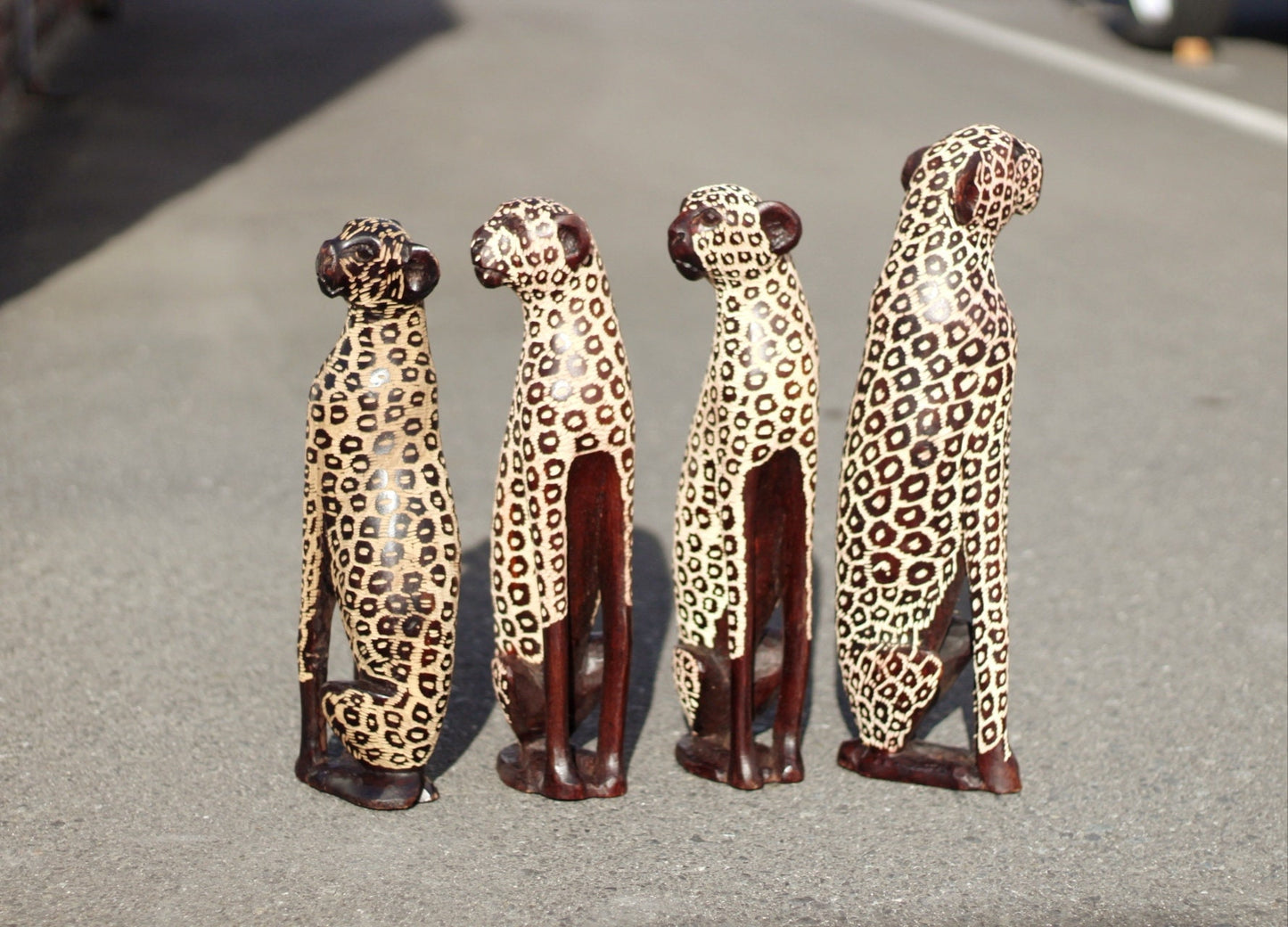 Seating Leopard Figurines. Inner Olive wood dark brown polished and gouged spotted hand carved big cat Sculptures. African art Decor Gifts.