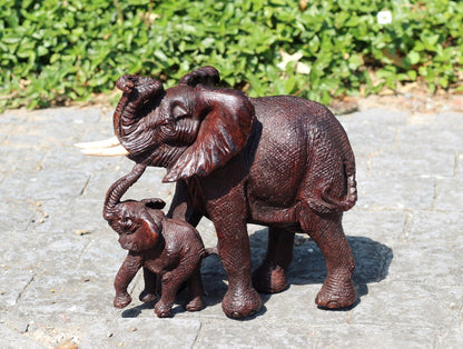 Realistic Twisted trunk Elephant and Calf Ironwood Carving. Zimbabwean hand carved fully detailed lifelike figurines. African Fine Art Gifts