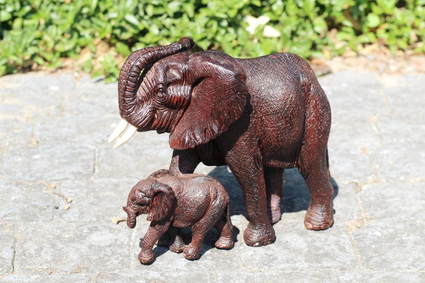 Realistic Twisted trunk Elephant and Calf Ironwood Carving. Zimbabwean hand carved fully detailed lifelike figurines. African Fine Art Gifts