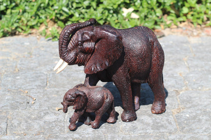 Realistic Twisted trunk Elephant and Calf Ironwood Carving. Zimbabwean hand carved fully detailed lifelike figurines. African Fine Art Gifts