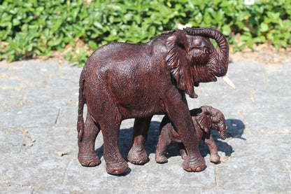 Realistic Twisted trunk Elephant and Calf Ironwood Carving. Zimbabwean hand carved fully detailed lifelike figurines. African Fine Art Gifts