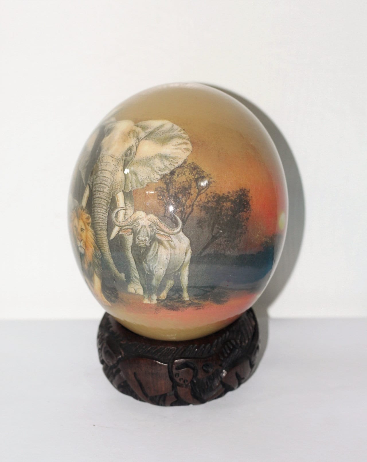 Brown Decoupage African Big Five Animals on Authentic Ostrich Egg Shell. Sunset Art, Comes with a Malawian carved ring stand. Ready to Ship