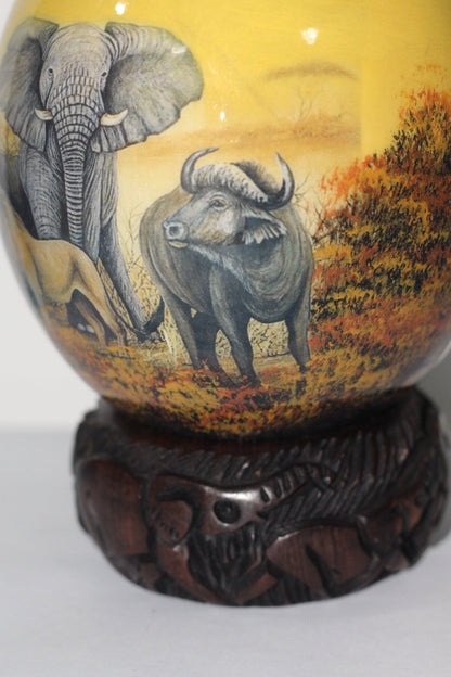 Green and Yellow Decoupage African Big Five Animals on Authentic Ostrich Egg Shell gifts. Comes with a Malawi ring stand, ready to Ship.