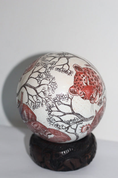 Ostrich Egg Fine Art Scrimshaw featuring the African Big 5 Heads. Burnt Amber and Toney Red Authentic Ostrich Egg Painted Safari Carving.