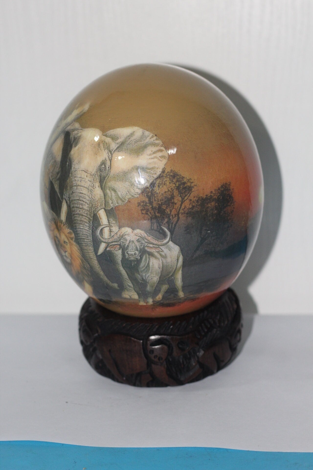 Brown Decoupage African Big Five Animals on Authentic Ostrich Egg Shell. Sunset Art, Comes with a Malawian carved ring stand. Ready to Ship