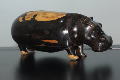 Lifelike Multi Coloured Ebony Wood Carved Hippo Sculpture. Has visible wood grains in the dark rich wood. Unique African gifts ready to Ship