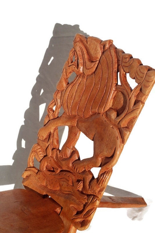 Medium Sized African Polished Foldable chair. Malawian Mahogany Carved Roaring Lion and Sleeping Antelope. Home /Office Art decor gifts
