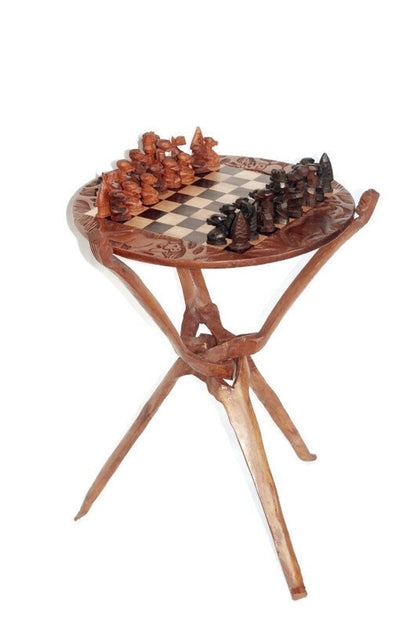 Handcarved Mahogany Wood Foldable Chess Table with reversible African Big 5 animals top. Has ebony wood for dark parts of the Gaming Board