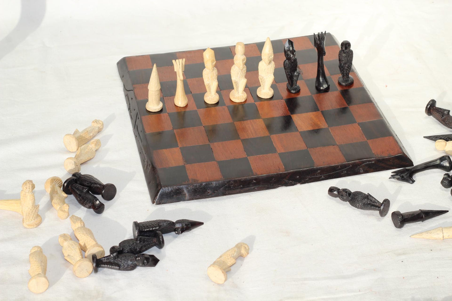 Malawian handcarved mix of Ebony and Mahogany Wood 30cm board and Tanzanian Makonde Monkey Themed Chess Pieces Set. unique combo Gift set