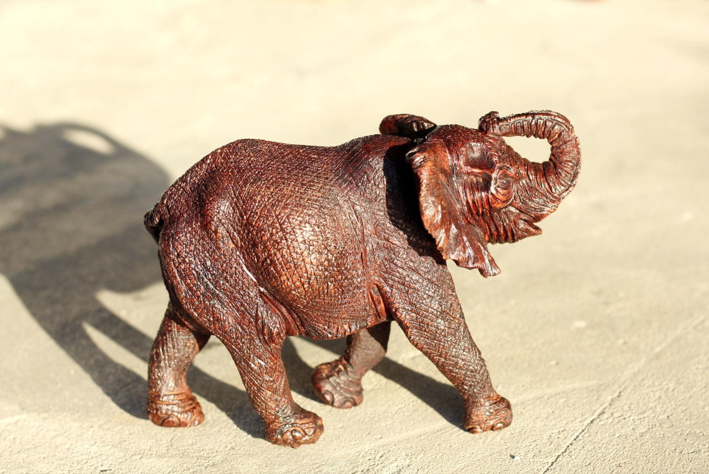Realistic Elephant Carving Ironwood Sculpture. Walking with trunk upwards, Zimbabwean hand carved fully detailed art figurine. Ready to Ship