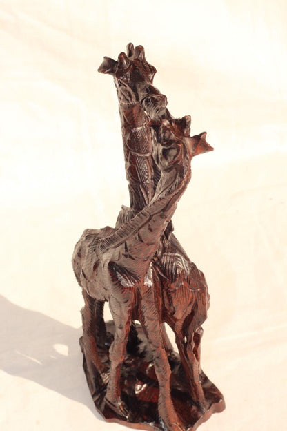 Kissing Giraffe Lovers Dark Brown Iron Wood Art figurines. Zimbabwean home decor handcarved Sculptures. Engagement/ Wedding African gifts