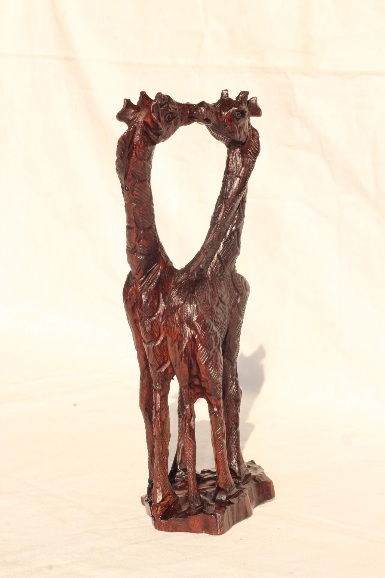 Kissing Giraffe Lovers Dark Brown Iron Wood Art figurines. Zimbabwean home decor handcarved Sculptures. Engagement/ Wedding African gifts