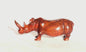 Zambian Teak wood Rhino Sculpture. Handcarved Rhinoceros figurines made from a reddish brown Wood with amazing visible grains.