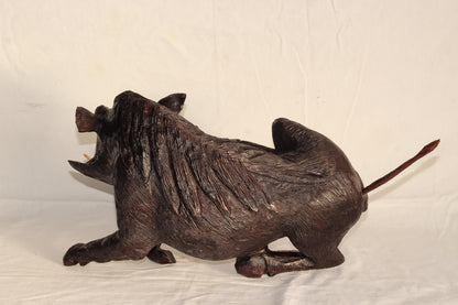 Fine Art Dark Brown Scratching Warthog Figurine. Fully detailed realistic lifelike Wooden Sculpture. Zimbabwean handcarved home/office decor