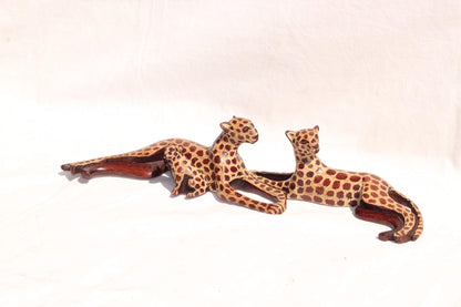 Sleeping Leopard Male and Female. Inner Olive wood dark brown polished and gouged spotted hand carved big cat Sculptures. African art Gifts
