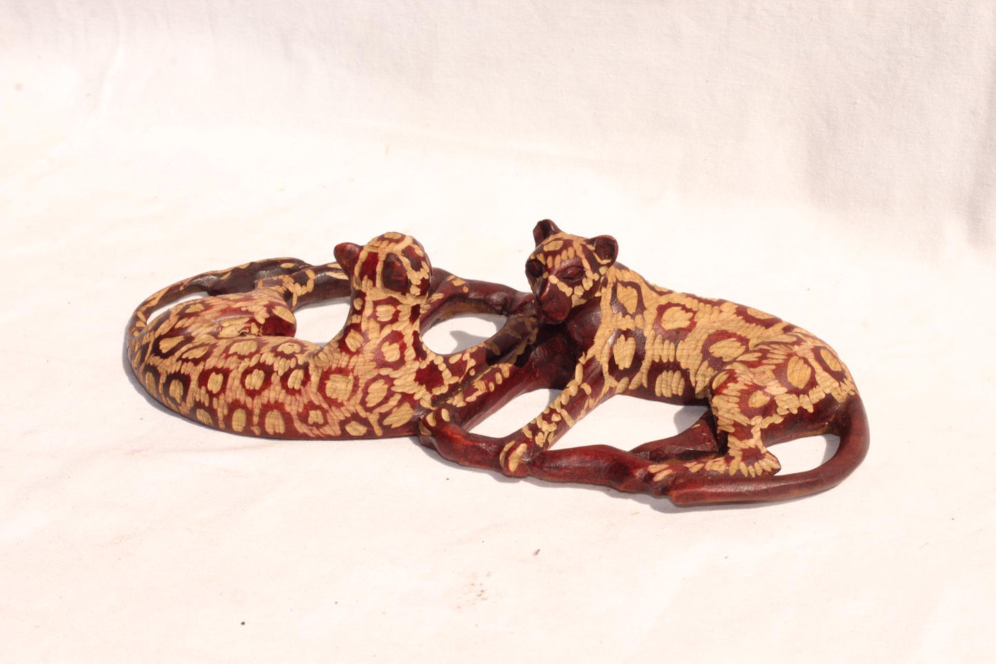Sleeping Leopard Male and Female. Inner Olive wood dark brown polished and gouged spotted hand carved big cat Sculptures. African art Gifts