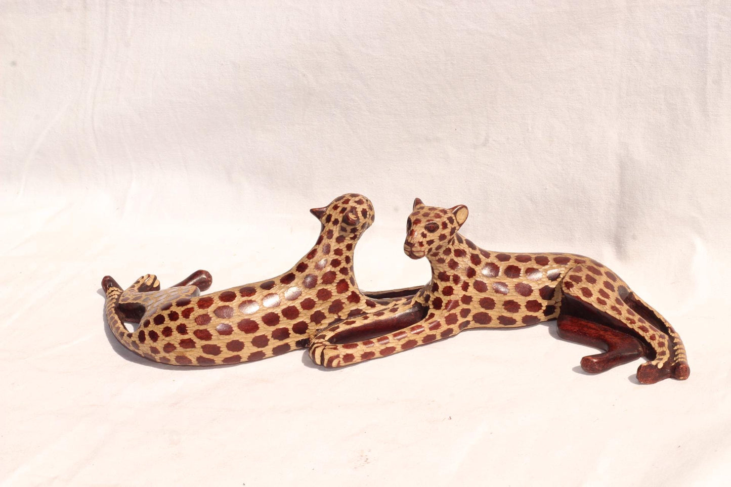 Sleeping Leopard Male and Female. Inner Olive wood dark brown polished and gouged spotted hand carved big cat Sculptures. African art Gifts