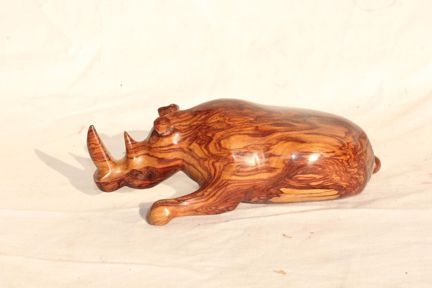 Zebra Wood Carved Sitting Rhino figurine. Zambian Handmade African Art decor, shipping worldwide. Unique Collector's item/ Christmas gifts
