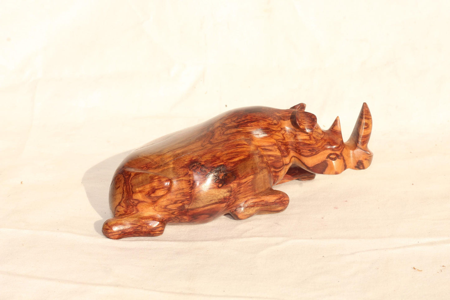 Zebra Wood Carved Sitting Rhino figurine. Zambian Handmade African Art decor, shipping worldwide. Unique Collector's item/ Christmas gifts