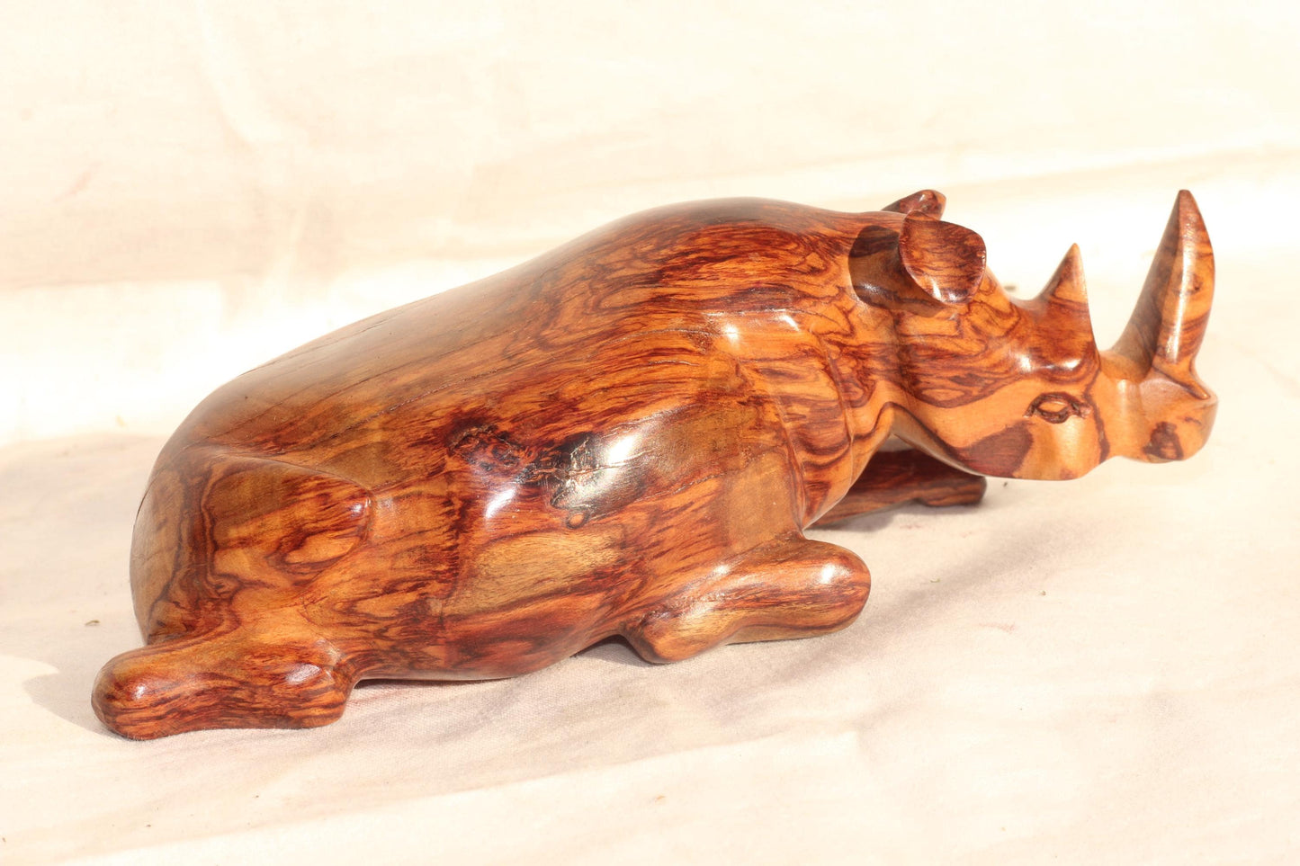 Zebra Wood Carved Sitting Rhino figurine. Zambian Handmade African Art decor, shipping worldwide. Unique Collector's item/ Christmas gifts