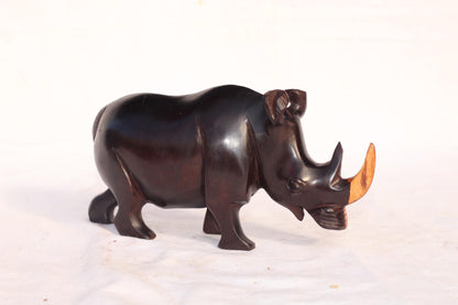 Smooth Zambian Ebony wood Multi coloured, Walking open mouth handcarved Rhino. Unique African Art Christmas Gifts, for home/office decor.