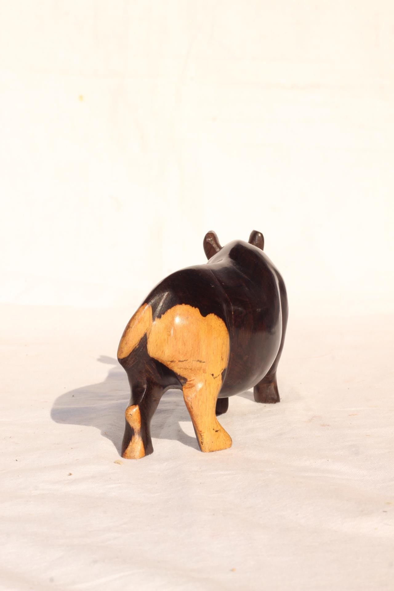 Smooth Zambian Ebony wood Multi coloured, Walking open mouth handcarved Rhino. Unique African Art Christmas Gifts, for home/office decor.