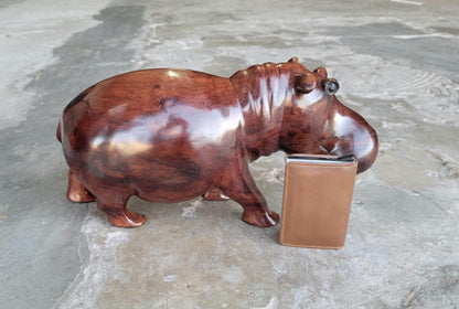 Dark Brown Lifelike smooth Iron Wood Hippopotamus Masterpiece. African Hand carved Hippo Art figurine / Decor. Weighs 3.5kgs, 35×17×13cm.