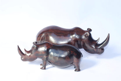 Smooth Chubby Zambian Ebony wood handcarved Rhino. Unique African Art Gifts, home and office decor. Walking Long Horn Rhinoceros figurines.