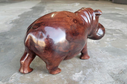 Dark Brown Lifelike smooth Iron Wood Hippopotamus Masterpiece. African Hand carved Hippo Art figurine / Decor. Weighs 3.5kgs, 35×17×13cm.