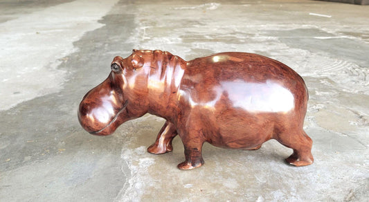 Dark Brown Lifelike smooth Iron Wood Hippopotamus Masterpiece. African Hand carved Hippo Art figurine / Decor. Weighs 3.5kgs, 35×17×13cm.