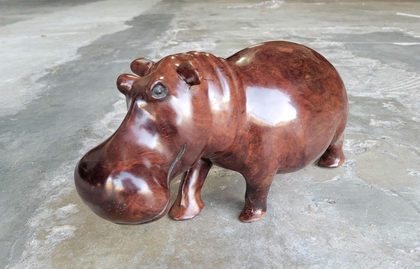 Dark Brown Lifelike smooth Iron Wood Hippopotamus Masterpiece. African Hand carved Hippo Art figurine / Decor. Weighs 3.5kgs, 35×17×13cm.