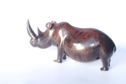 Smooth Chubby Zambian Ebony wood handcarved Rhino. Unique African Art Gifts, home and office decor. Walking Long Horn Rhinoceros figurines.