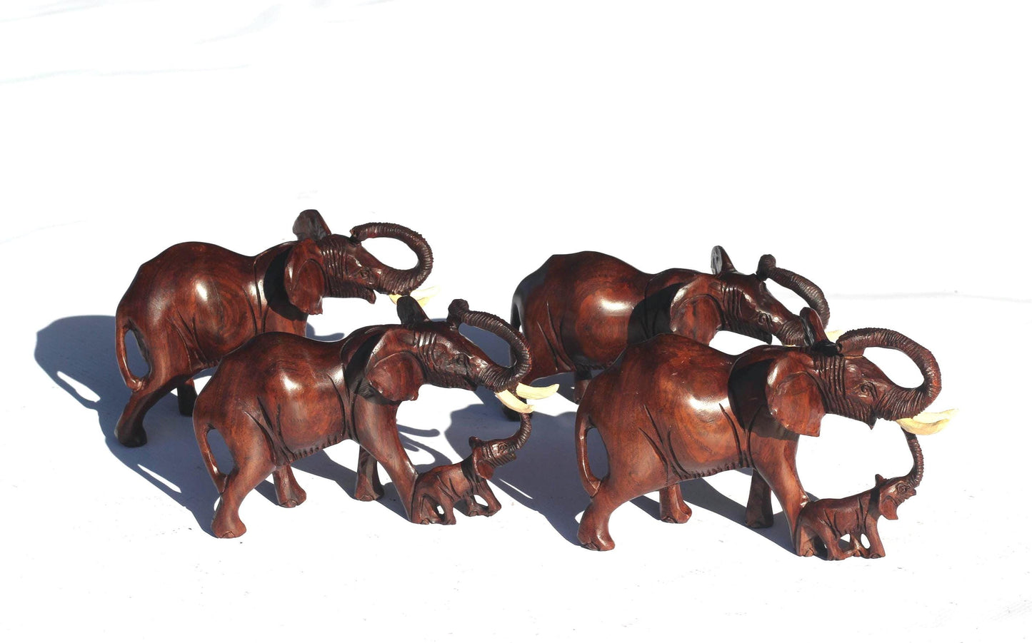 Charging Mother Elephant and Calf Ironwood Sculpture. Zimbabwean hand carved Smooth lifelike figurines. African Big 5 Fine Art Gifts