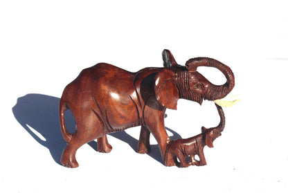 Charging Mother Elephant and Calf Ironwood Sculpture. Zimbabwean hand carved Smooth lifelike figurines. African Big 5 Fine Art Gifts