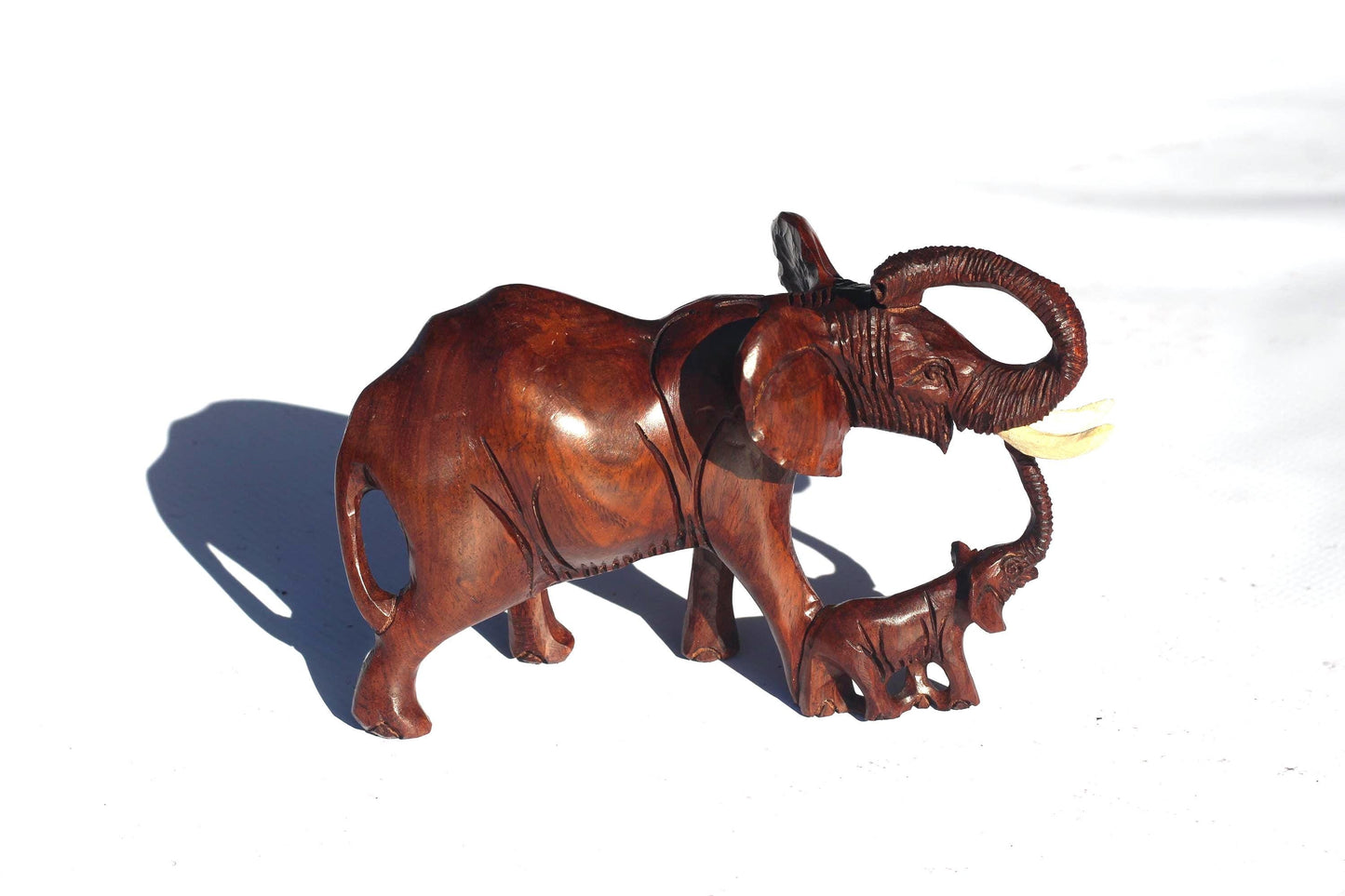 Charging Mother Elephant and Calf Ironwood Sculpture. Zimbabwean hand carved Smooth lifelike figurines. African Big 5 Fine Art Gifts