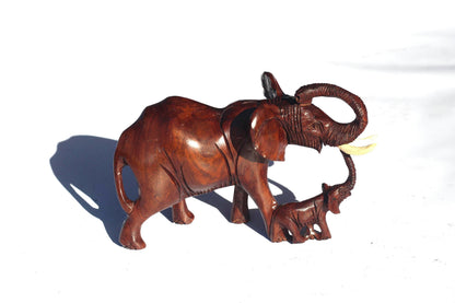 Charging Mother Elephant and Calf Ironwood Sculpture. Zimbabwean hand carved Smooth lifelike figurines. African Big 5 Fine Art Gifts