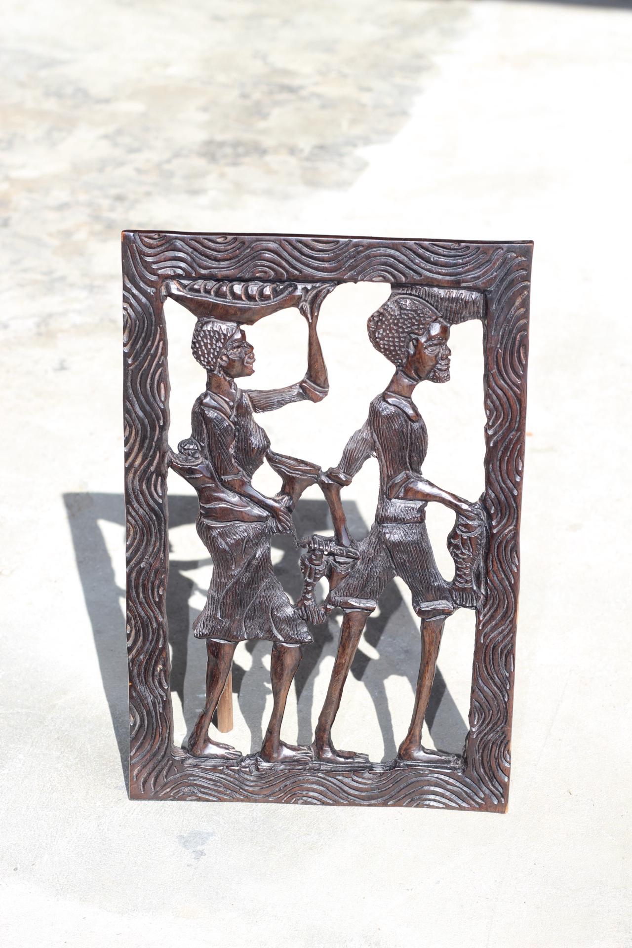 African Village Life Frame with a man carrying Fish and Lady with child. Malawian Dark Iron Wood Detailed Handcarved Wall Art Gifts