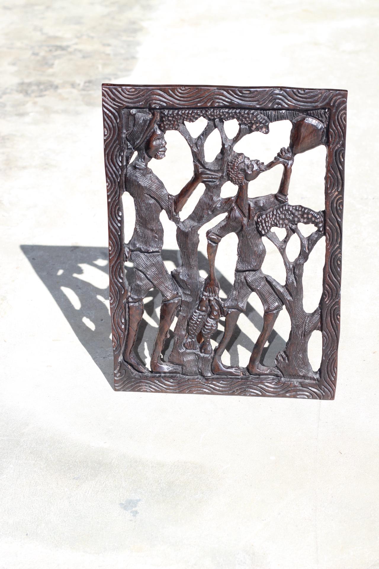 African Village Life Frame with a man carrying Fish and Lady with child. Malawian Dark Iron Wood Detailed Handcarved Wall Art Gifts