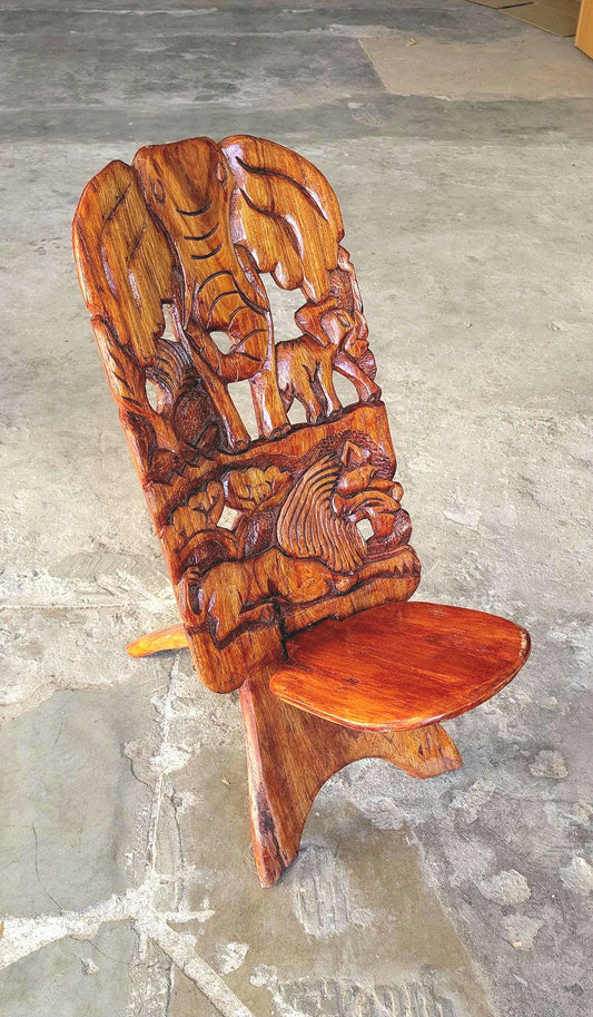Medium Sized African Vanished Foldable chair. Malawian Mahogany Carved Elephant head and Sleeping Lion theme. Home / Office Art decor gifts