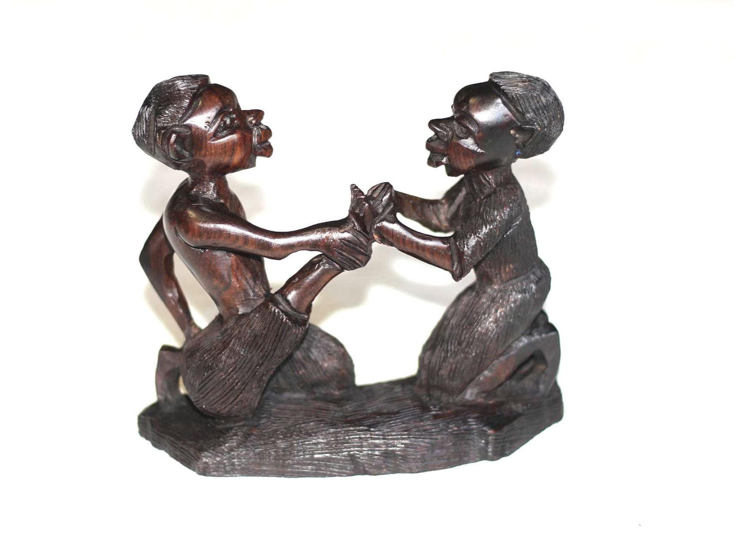 African Village Couple love story. Wife helps husband by removing thorns after working. Handmade Ironwood African Art Sculptures/Figurines.
