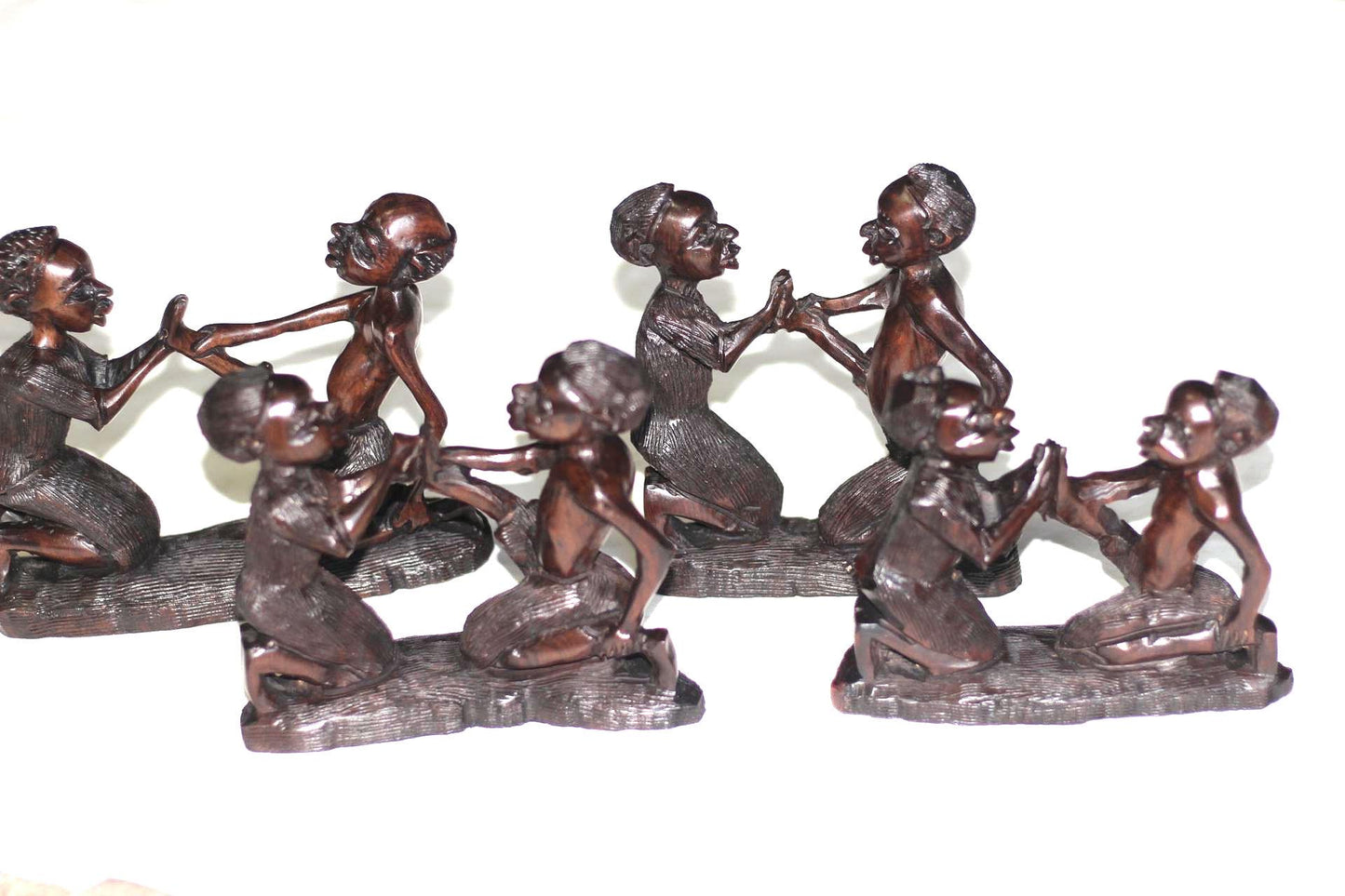 African Village Couple love story. Wife helps husband by removing thorns after working. Handmade Ironwood African Art Sculptures/Figurines.